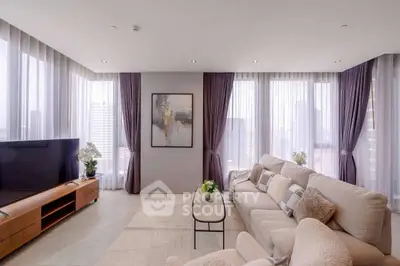 Luxurious modern living room with panoramic city views and elegant decor