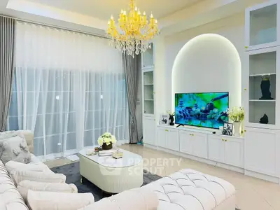 Luxurious living room with elegant chandelier and modern decor