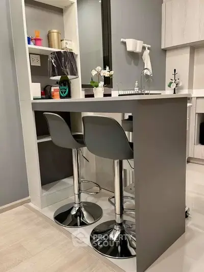 Modern kitchen with sleek bar stools and stylish decor