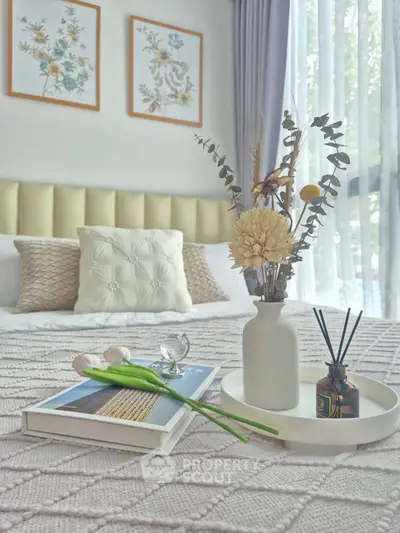 Elegant bedroom with cozy decor and natural light