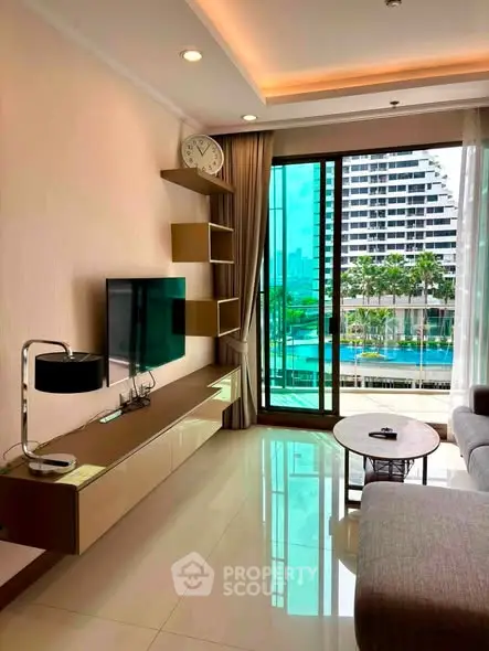 Modern living room with sleek furniture and pool view in luxury apartment