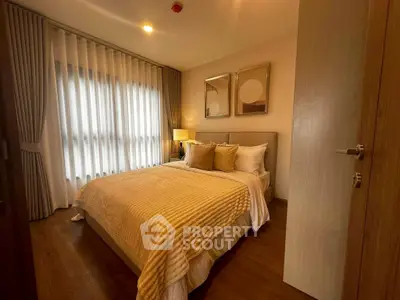 Cozy bedroom with elegant decor and soft lighting, perfect for relaxation.