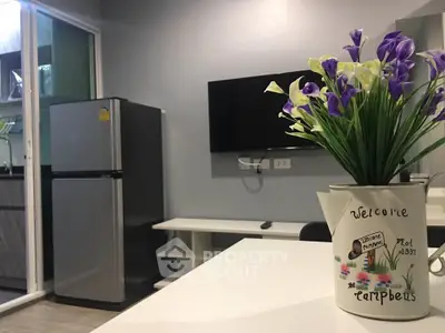 Modern living room with stylish decor and sleek appliances