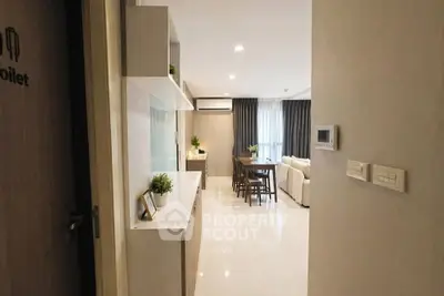 Modern open-plan living room with dining area and stylish decor