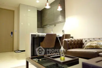 Stylish modern living room with open kitchen and elegant lighting