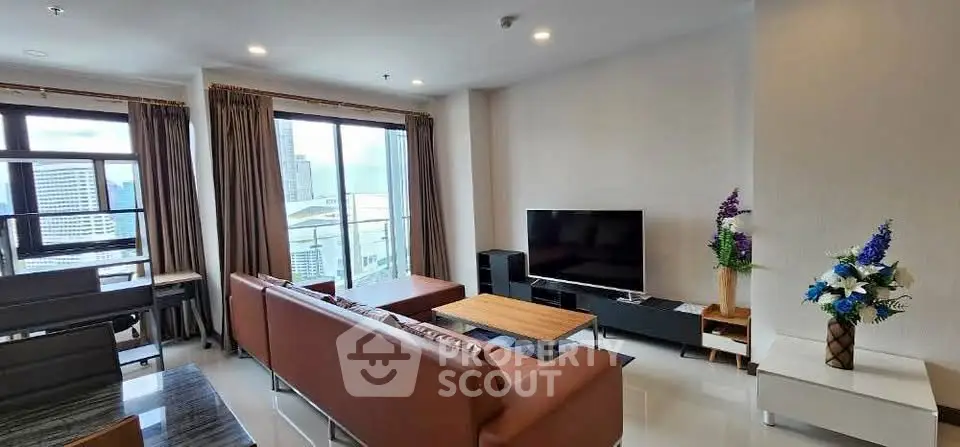 Spacious modern living room with city view and elegant decor