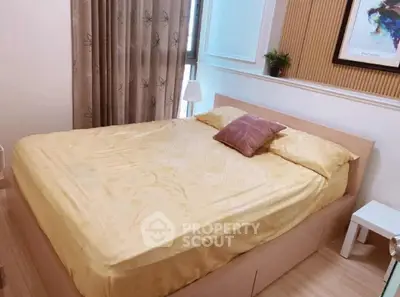 Cozy bedroom with modern decor and natural light, featuring a comfortable bed and stylish furnishings.