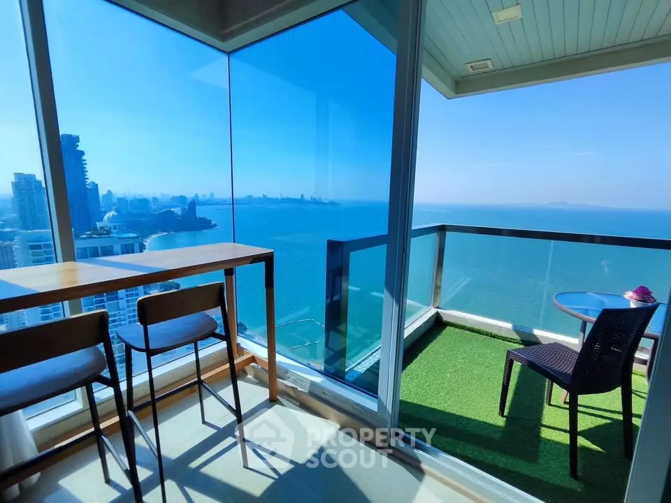 Stunning corner unit with panoramic ocean views and spacious balcony, perfect for relaxation and entertaining.