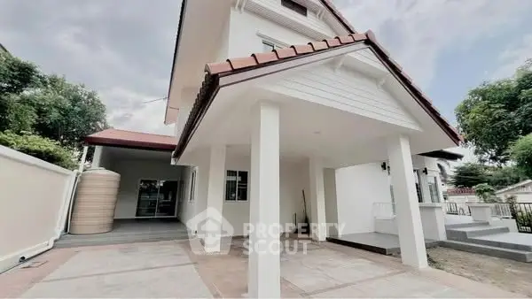 Charming two-story house with spacious driveway and modern architecture