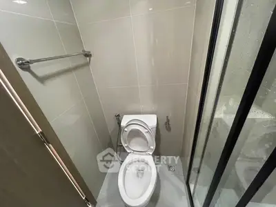 Modern bathroom with sleek design and glass shower enclosure