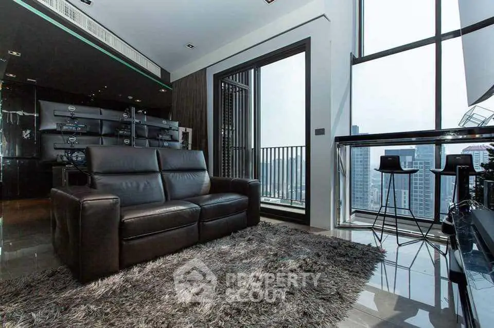 Luxurious modern living room with city view and sleek black furniture