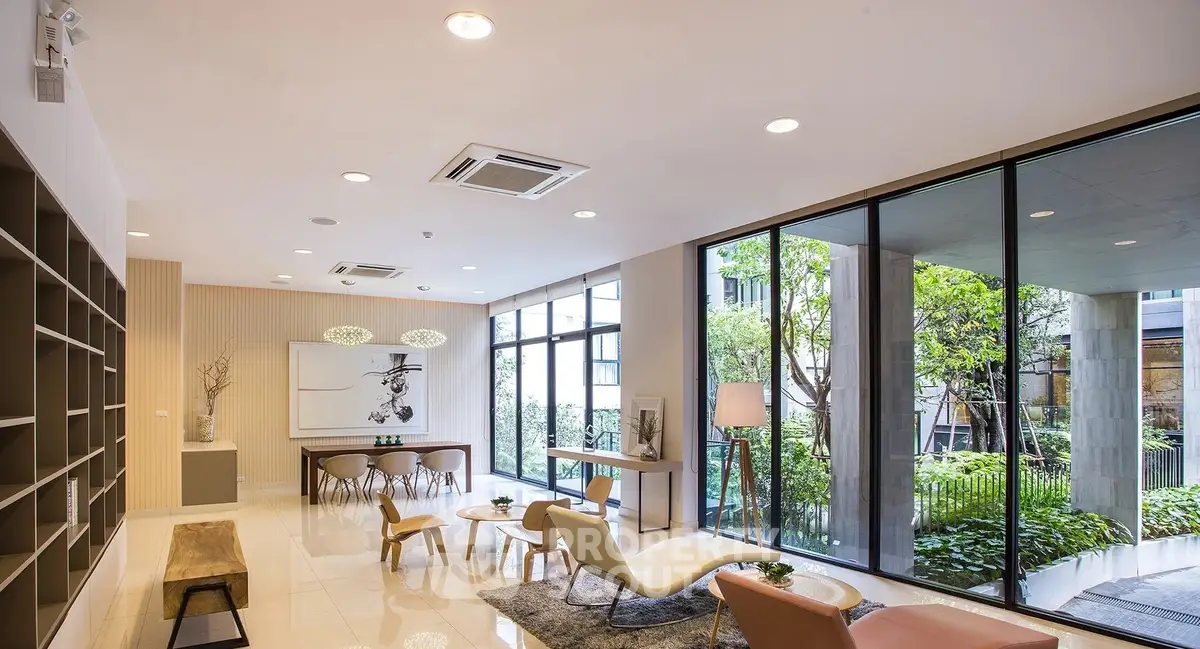 Luxurious modern living room with garden view and elegant decor