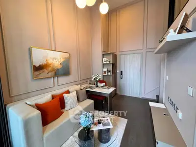 Modern living room with elegant decor and cozy seating area, perfect for relaxation and entertaining.