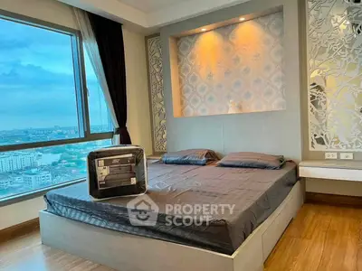 Luxurious bedroom with stunning city view and elegant decor