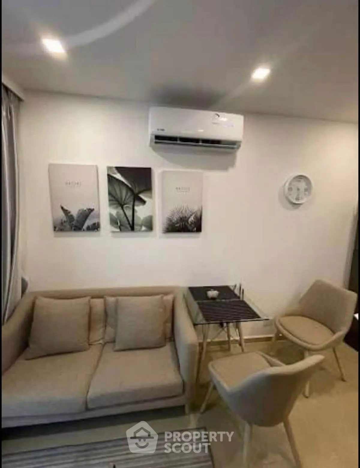 Cozy living room with modern decor and air conditioning