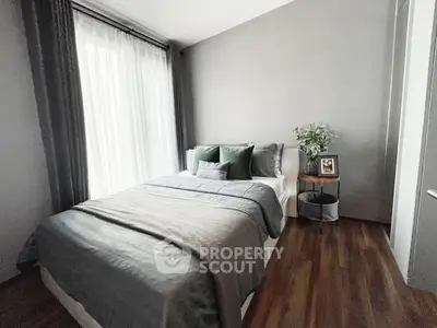 Cozy modern bedroom with stylish decor and natural light