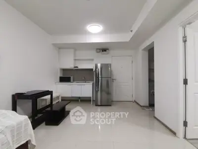 Modern minimalist kitchen with sleek appliances and open layout