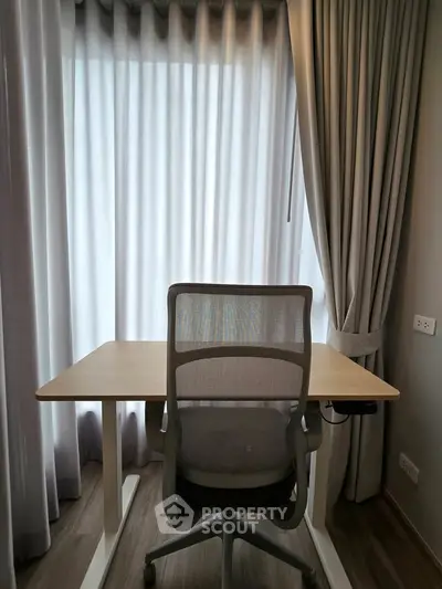 Modern study room with sleek desk and ergonomic chair, perfect for productivity and comfort.