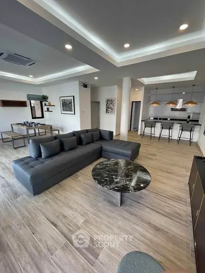 Spacious modern living room with elegant decor and open layout