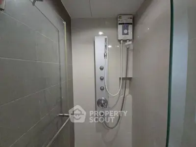 Modern bathroom shower with sleek design and advanced shower panel