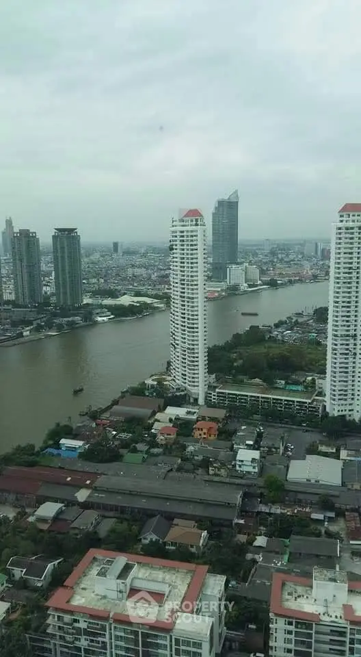 Stunning riverfront cityscape with high-rise buildings and scenic views.