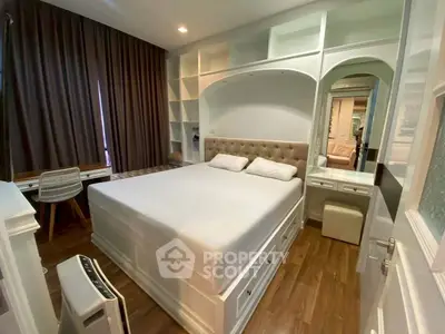 Cozy bedroom with modern furnishings and ample storage space