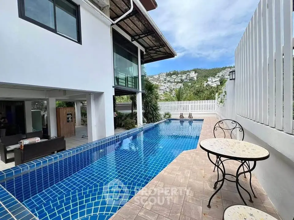 Luxurious villa with private pool and stunning mountain views, perfect for relaxation and entertaining.