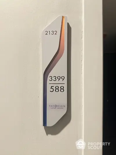 Modern apartment number sign with sleek design at The Origin Ladprao Bangkok