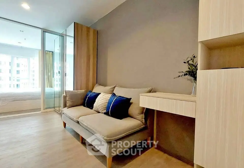 Modern living room with cozy sofa and stylish decor in a bright apartment