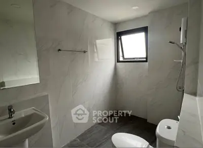 Modern bathroom with sleek fixtures and natural light