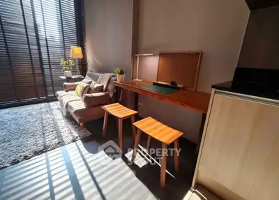 Modern living room with stylish furniture and abundant natural light