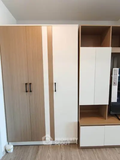Modern wardrobe and storage unit in stylish apartment interior