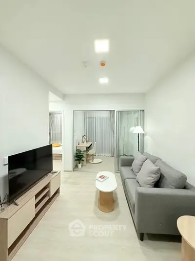 Modern living room with sleek furniture and natural light