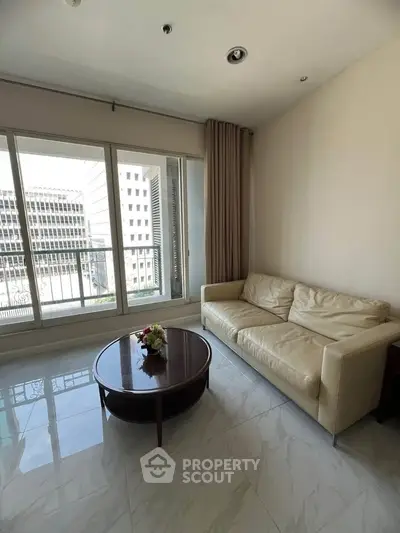 Modern living room with sleek sofa and city view