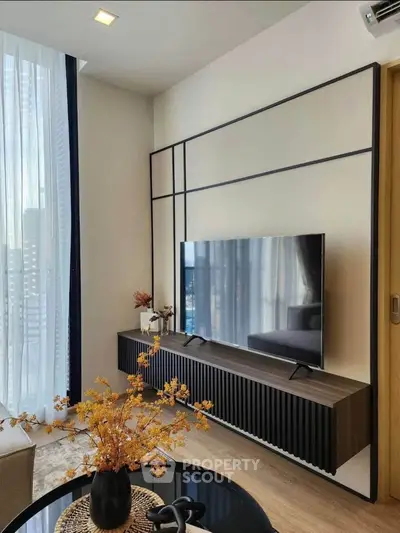 Modern living room with sleek TV setup and stylish decor