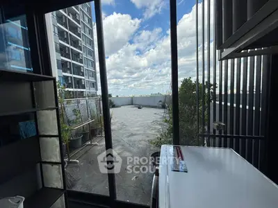 Stunning balcony with expansive city view and modern design elements.