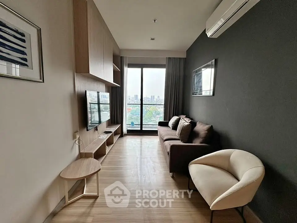 Modern living room with city view, stylish furniture, and sleek design.