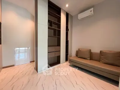 Modern living room with sleek shelving and air conditioning