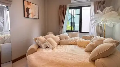 Cozy bedroom with plush round bed and elegant decor