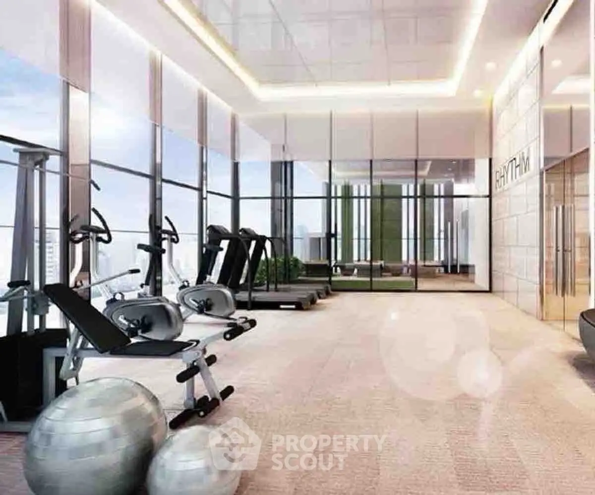 Luxurious modern gym with panoramic city views and state-of-the-art equipment.