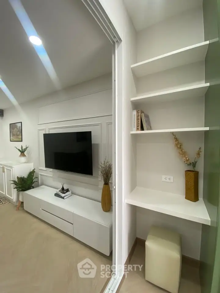 Modern living room with sleek TV unit and stylish decor
