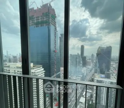 Stunning cityscape view from high-rise balcony with modern skyline
