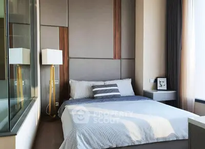Modern bedroom with stylish decor and ample natural light