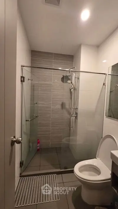 Modern bathroom with glass shower and sleek design