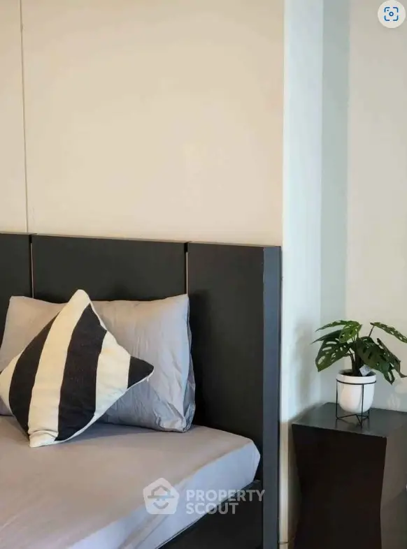 Cozy bedroom corner with modern bed and stylish decor