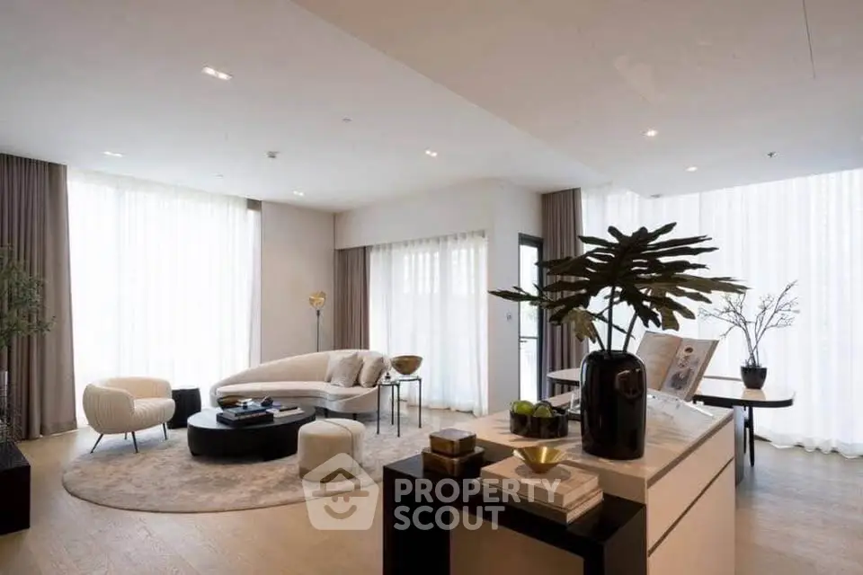 Luxurious modern living room with elegant decor and natural light