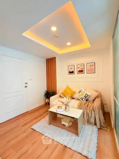 Cozy living room with modern decor and warm lighting, perfect for relaxation.