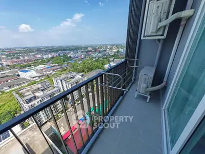 Stunning high-rise balcony with panoramic city views, perfect for urban living enthusiasts.