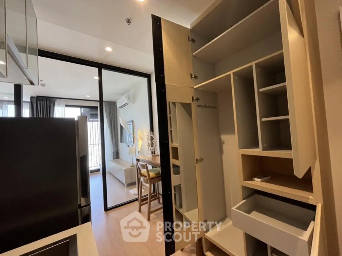 Modern apartment with open kitchen and spacious storage solutions