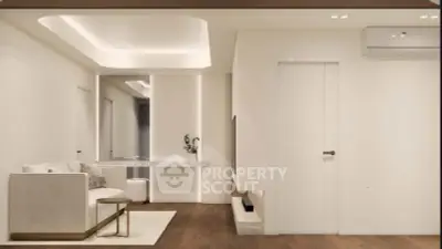 Modern minimalist living room with sleek design and neutral tones.